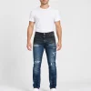 Мъжки дънки DSQUARED2 с протривания и бели пръски — върху модел
